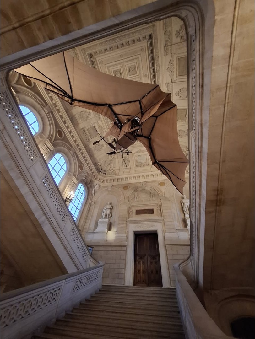 Clément Ader's bat-winged flying machine suspended above the grand staircase of the Musée des Arts et Métiers