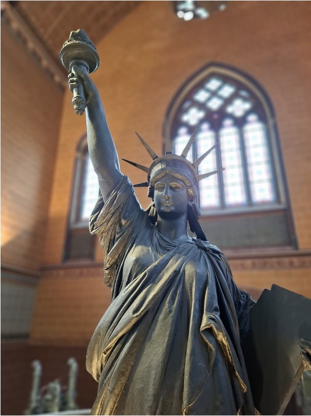 Bartholdi's original plaster model of the Statue of Liberty inside the chapel of the Musée des Arts et Métiers